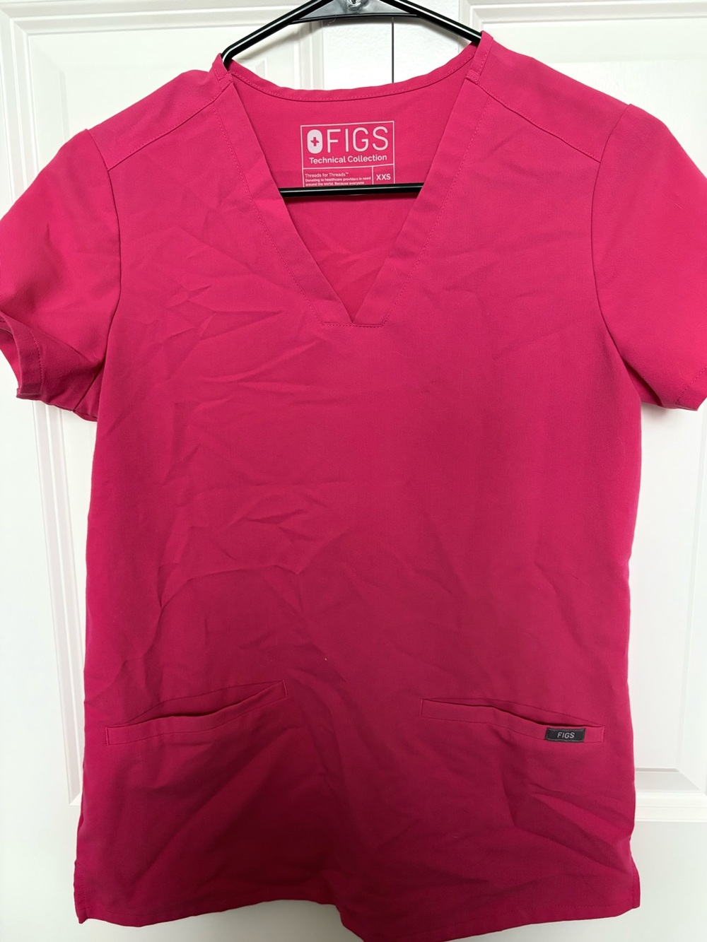 FIGS Women's Catarina Scrub Top in Fuchsia
